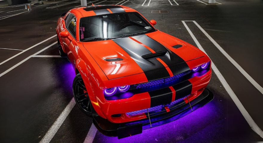 Car with LED underglow at a show